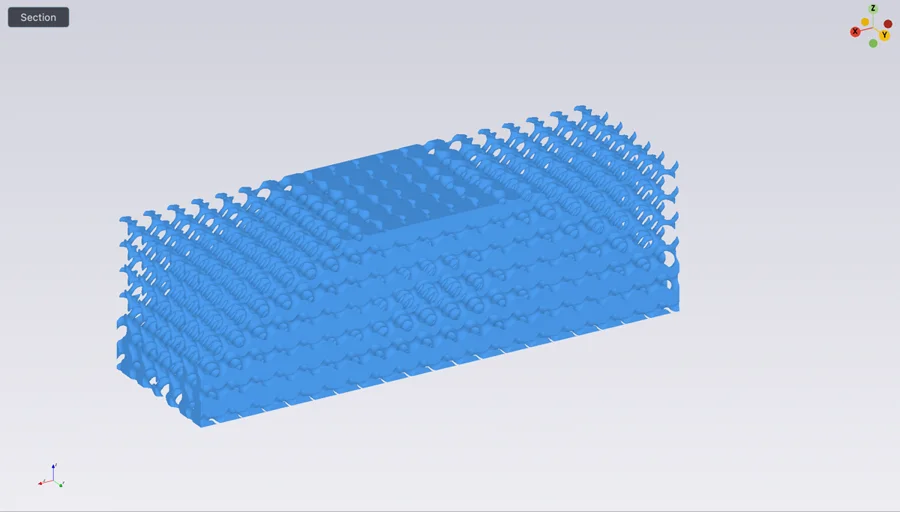 A gyroid lattice filling the beam, its wall thickness varying with the density map.